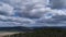 4k Timelapse of Majestic clouds shining through the colorful blue sky