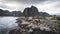 4k Timelapse movie film clip of Moving clouds timelapse over traditional Norwegian fisherman`s cabins, rorbuer, on the