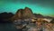 4k Timelapse movie film clip of Northern Lights Aurora Borealis with classic view of the fisherman s village of Hamnoy