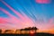 4k Timelapse Of Moving Clouds Trails In Morning Sky. Long Exposure Timelapse Fasters Clouds Above Pine Forest. Amazing