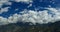 4k timelapse puffy clouds mass rolling over Tibet mountaintop,roof of the World.