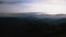 4k timelapse of sunrise at mountains under mist in the morning at Khao Kho National Park, Phetchabun province, Thailand, wide