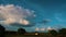 4K timelapse video of a huge cloud moving mesmerizingly over a rural crop field