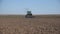 4K Tractor Plowing Field in Spring, Farmer Working in Agricultural Land, Farming