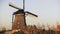 4K Traditional old Dutch rustic windmill working. Netherlands. European historical landmark. Farm mill spinning slowly.