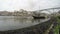 4K. Traditional Portuguese boats on Douro river, City of Porto, Portugal. Time Lapse in cloudy weather