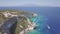 4K UHD aerial view of Agios Nikolaos blue caves in Zakynthos Zante island, in Greece - Log