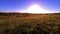 4K UHD mountain meadow timelapse at the summer. Clouds, trees, green grass and sun rays movement.