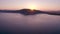 4K video aerial view of Salda lake in Turkey with sunrise and silhouette hill background. Travel Tourism concept.