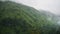 4k video of beautiful valley and mountain slope at cloudy rainy day