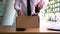 4k video of businessman has a brown cardboard box for resigning from work or unemployment and change job concept