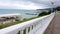 4K VIDEO, Classic white balustrade on the embankment against the background of the sea. Beautiful view of the sea at