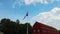 4K video of Denmark Flag Danish blowing in the blue sky. It is situated in center of Copenhagen.