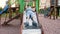 4k video of funny little toddler boy sliding down on slide at playground