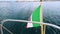 4K video of Italian flag fluttering in the wind. The flag is on a yacht that goes on the sea off the island of Sardinia.