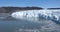 4k Video of Large chunk of ice breaking of calving glacier from Eqi Eqip Sermia Glacier in Greenland near Ilulissat