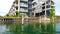 4K video of Luxury apartment buildings standing on the North Sea in central Copenhagen. The water is crystal and