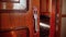 4k video of old wooden door sliding and opening luxury train coupe in vintage retro express