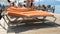 4k video of people relaxing on sunbeds on wooden pier at sunny day on sea beach