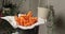 4k video slow motion stock footage french fries. used hand to eating chip fries on black plate and wooden table. party snack fast