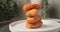 4k video slow motion stock footage,  rotating and close up nuggets chip fries stack on white plate. party snack fast food