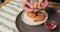 4k video slow motion stock footage,  used hand to eating nuggets chip fries stack on white plate. party snack fast food concept.