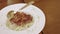 4k video, Spaghetti with Truffle white Sauce and Grilled beef steak slices on plate in restaurant.