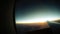 4K video : Sunrise moment through aircraft porthole time lapse footage