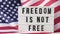 4k Waving American Flag Background. Lightbox with text FREEDOM IS NOT FREE Flag of the united states of America. July