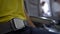 4K Woman fastening her seat belt inside airplane. Passenger sitting in plane