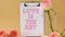 4k zoom in out LOVE IS THE KEY text on greeting card paper note. Delicate pink roses on beige background. Minimal trendy
