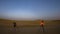 4kTime lapse of milky way night sky in sand dune desert, photo taken by photographer, empty quarter