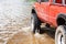 A 4wd truck on flooded road