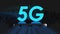 5 G text on a cellphone flying over a dark background, similar to a city. Fifth generation mobile network. Three-dimensional