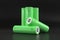 5 green cylindrical batteries on a black background. Storage battery or secondary cell. Rechargeable li-ion batteries