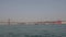 5 oct 2022 - Lisbon. Portugal - Ponte 25 de Abril - view of Lisboa Harbor with vessels and Port cranes