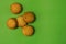 5 plain cookies in green background