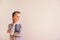 5 year old boy with very expressive thoughtful gesture, on white background with copy space area