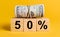 50 interest with money on a yellow background. The concept of business, finance, credit, income, savings, investments, exchange,