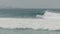 50 per cent slow motion shot surfer of a performing a carving top turn at kirra on the gold coast