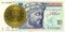 50 tunisian millimes coin against 10 tunisian dinar banknote