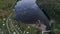 50fps aerial footage campsite camping caravan by lake Ragnerudssjoen in Dalsland Sweden beutiful nature forest pinetree