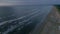 50fps aerial Sunset Couple with dog on Outdoor vacation caravan campsite camper on Melby beach, Sweden by the ocean