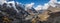 54MP Panoramic photo of Himalaya valley with glacier lakes and snowy summits covered in white clouds. Mera peak climbing route