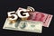 5G high speed communication network symbol standing on chinese yuan and american dollar bills isolated on black background. 3D