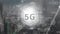 5g logo on a button with data connections on the background