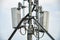 5G new radio telecommunication network antenna mounted on a metal pole providing strong signal waves