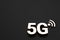 5G symbol laying in lower right corner and black background with copy space. 3D rendering