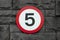 5mph (5 miles per hour) road sign