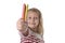 6 or 7 years old beautiful little girl holding multicolor crayons set in art school children education concept